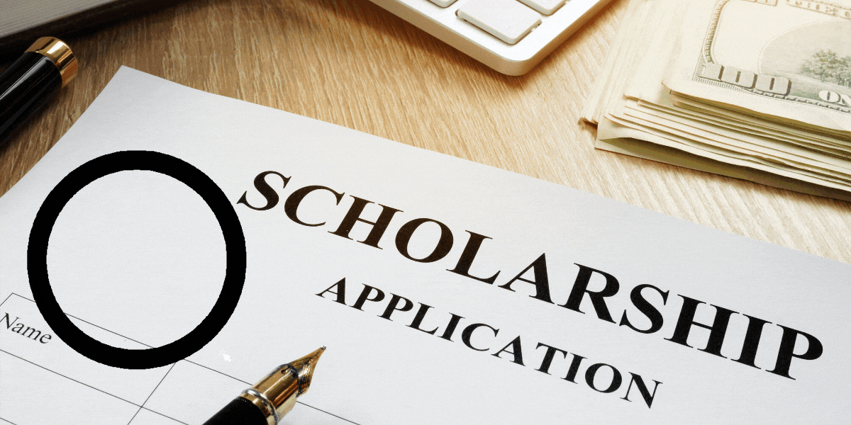 scholarship application paper, cash and checkmark