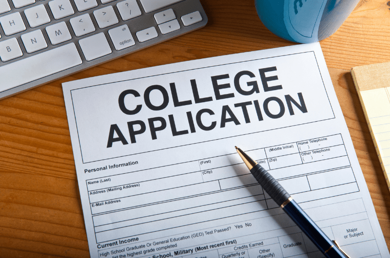 application form on table with pen